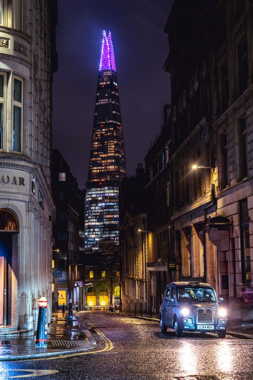 Night street in the City of London, England